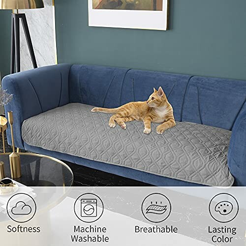 Cat lying on a quilted grey sofa cover with icons for softness, machine washable, breathable, lasting color.