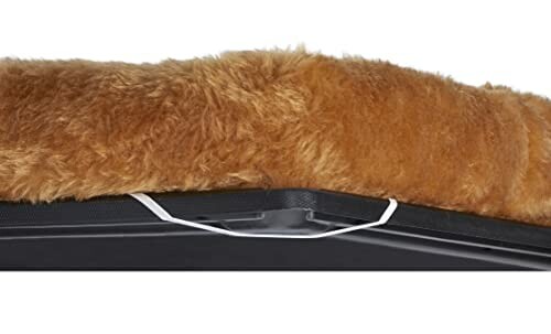 Close-up of a fluffy brown pet bed corner with elastic strap