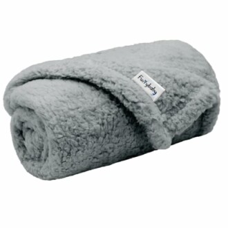 Gray fleece blanket rolled up